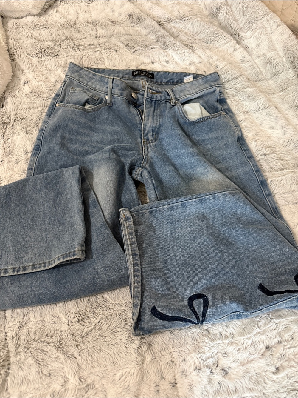 Reserved Light Wash Flared Jeans with Embroidered Hem